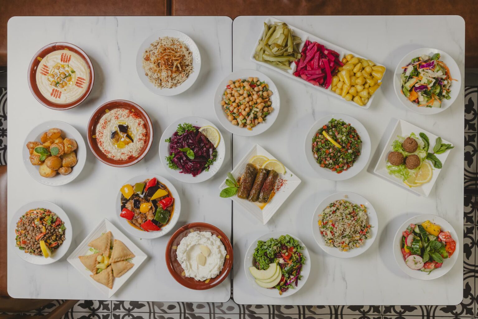 Lebanese Garden table food spread with hummus, salads and vegetables